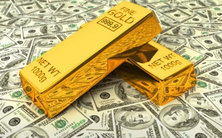 Цена на золото умеренно выросла под влиянием слабого доллара
